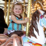 Lucy having fun on the carousel